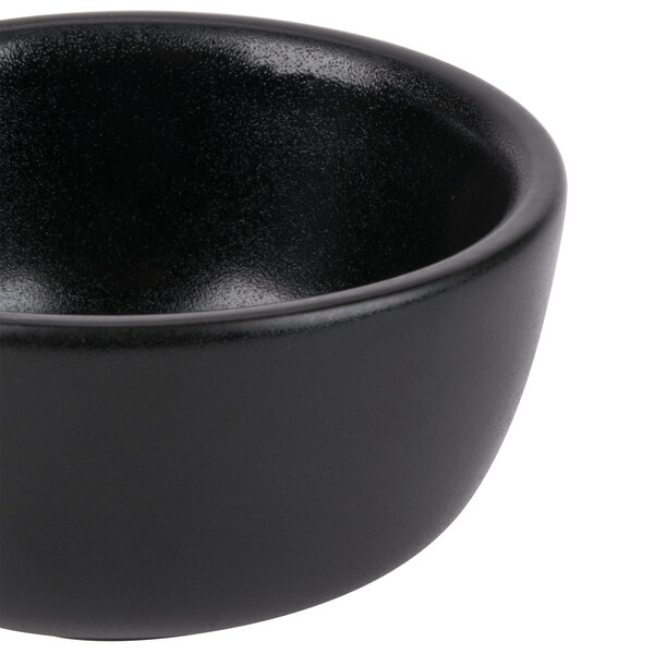 A close up of a black Hall China bowl.