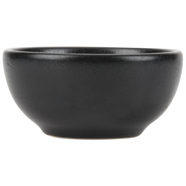 A black Hall China ramekin.