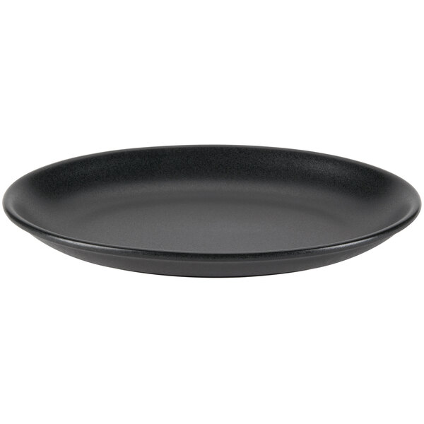 A black Hall China oval platter with a rim.