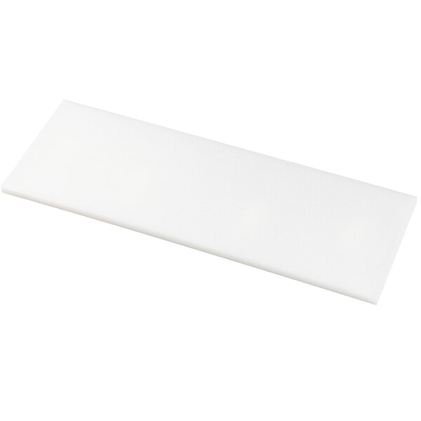 A white rectangular cutting board with a black handle.
