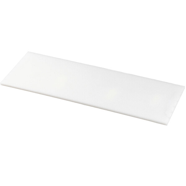 A white rectangular cutting board.