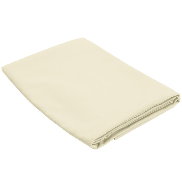 A folded ivory Intedge poly/cotton blend table cover.