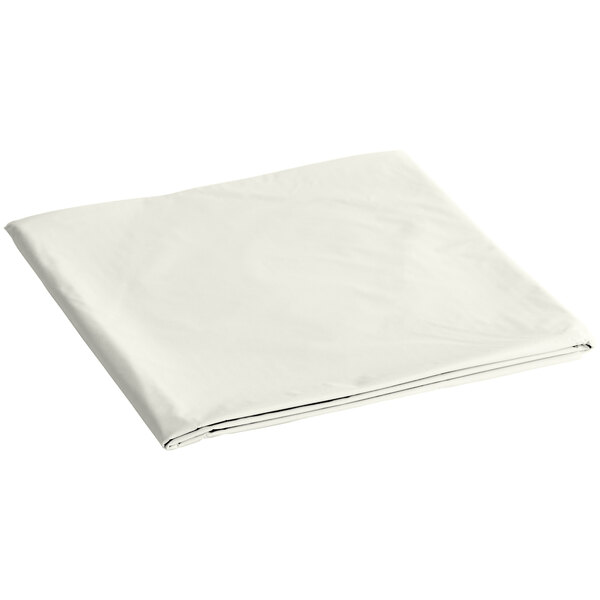 A folded ivory plastic table cover on a white background.
