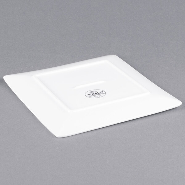A Libbey Ultra Bright White square porcelain plate with a white background.