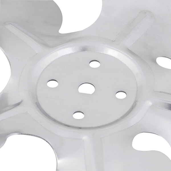 An Avantco metal fan blade with holes in it.