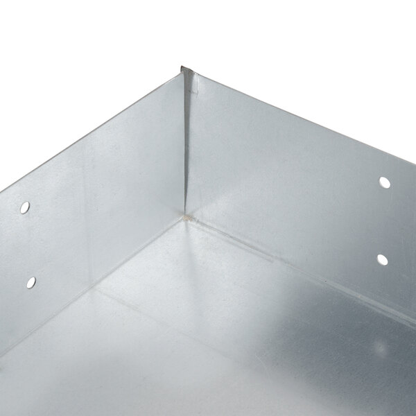 A metal Wind Guard Cover for a Party Que rotisserie grill with holes on the side.