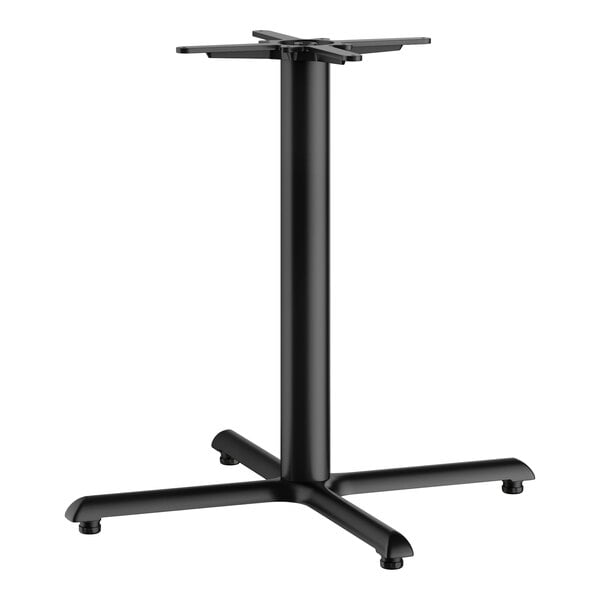 A FLAT Tech black metal table base on a black table.