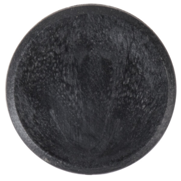 A black round chair glide plate.
