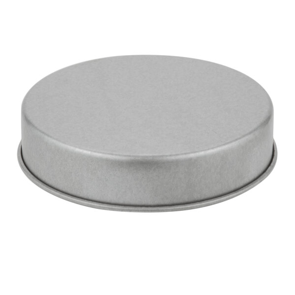 A Chicago Metallic round aluminized steel cake pan with a lid.