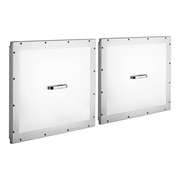 A pair of clear polycarbonate pan covers.