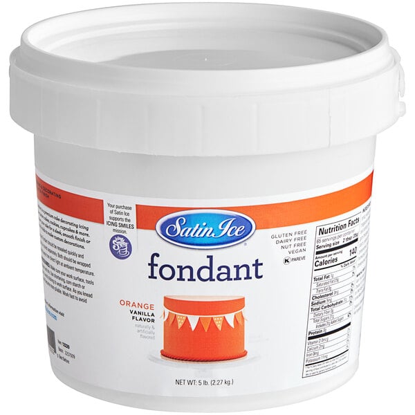 A white Satin Ice container of 5 lb. Orange Vanilla Rolled Fondant Icing on a table.