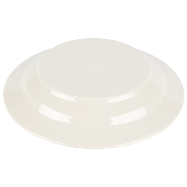 A white bowl with a curved edge.