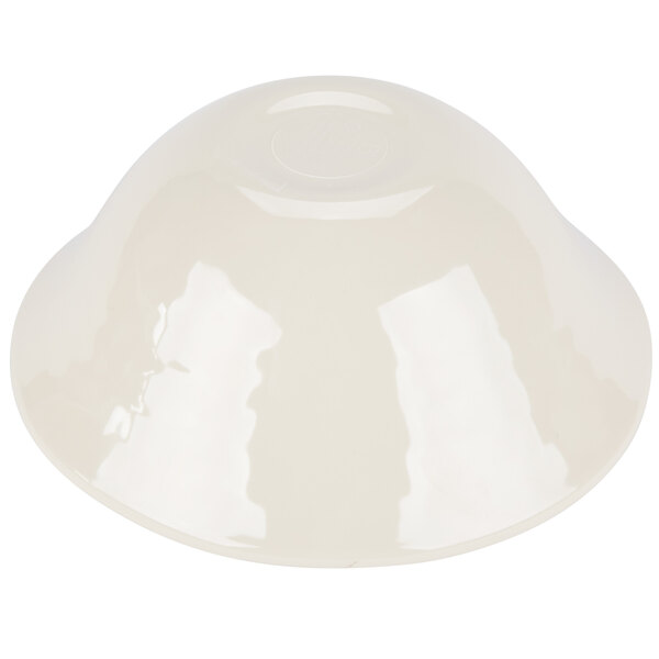 A smoke melamine bowl with a circular edge on a white surface.