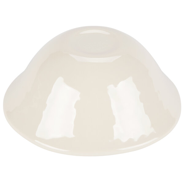 Aqua Carlisle melamine bowl with a white liquid in it.