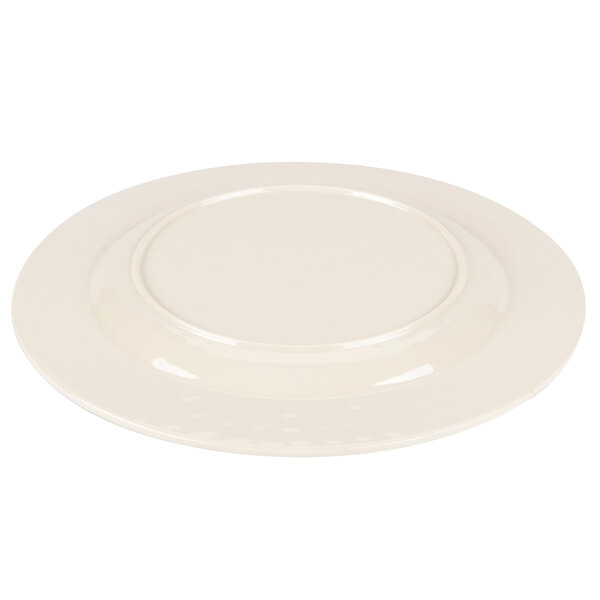 A white Carlisle melamine plate with a round rim.