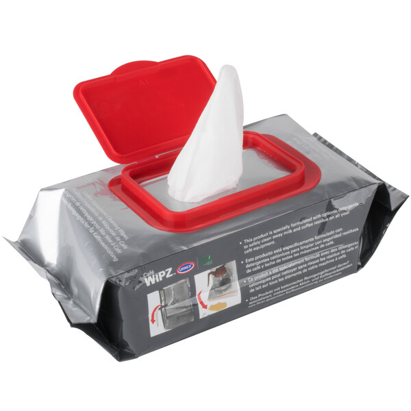 A white box with red and white Urnex Cafe Wipz Coffee Equipment Cleaning Wipes packaging.