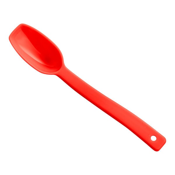 A red plastic Cambro salad bar spoon with a handle.