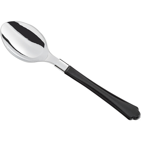 A silver spoon with a black handle.