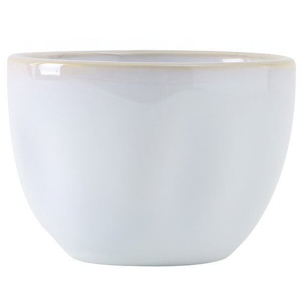 A white bowl with a gold rim.