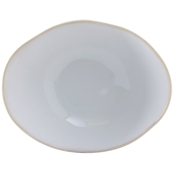 A white china bowl with a gold rim.