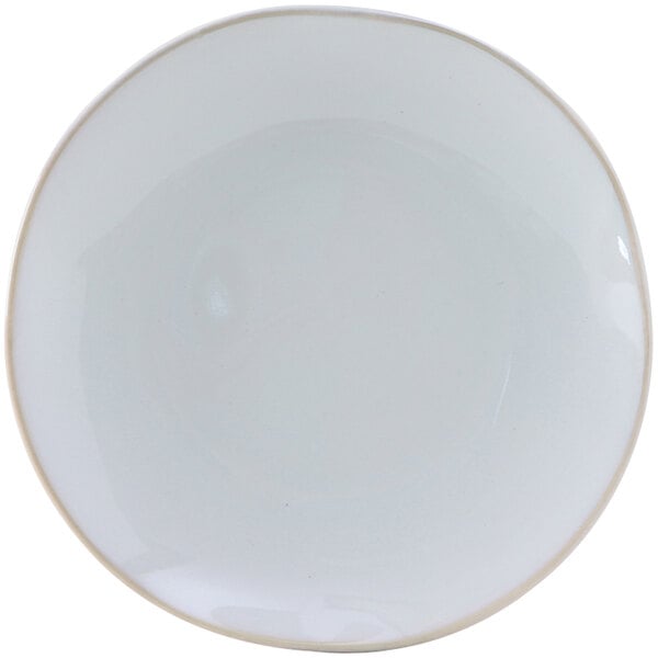 A white Tuxton Artisan china plate with a rim.