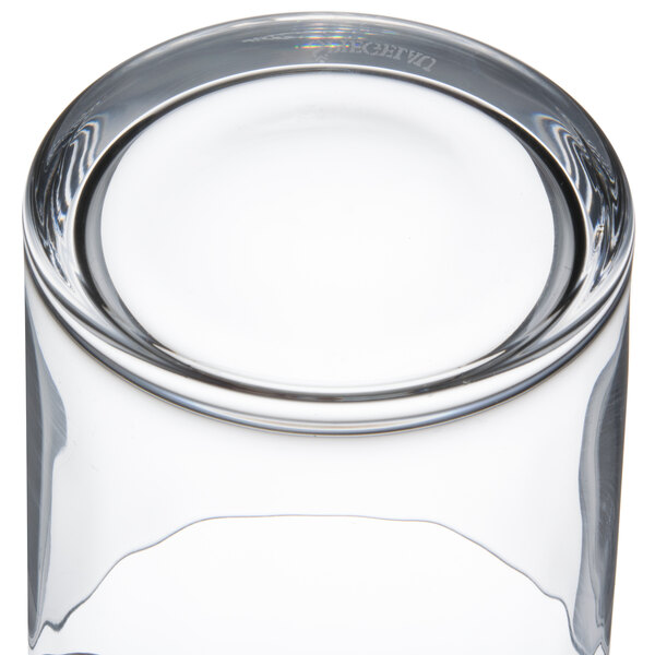 A close up of a clear Spiegelau Club Rocks glass with a round top.