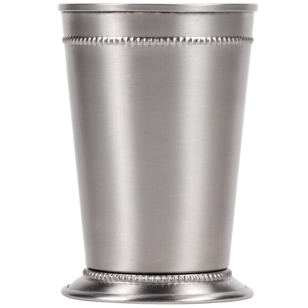 A World Tableware stainless steel mint julep cup with beaded trim on a metal surface.