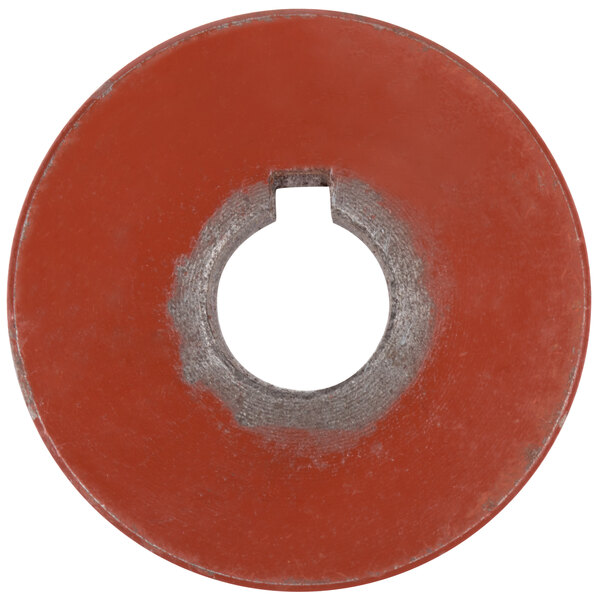 A round red object with a hole in the middle.
