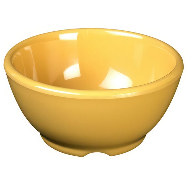 A yellow Thunder Group melamine soup bowl.