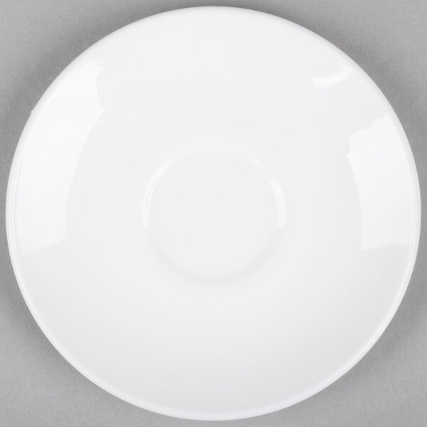 A white saucer with a white rim.