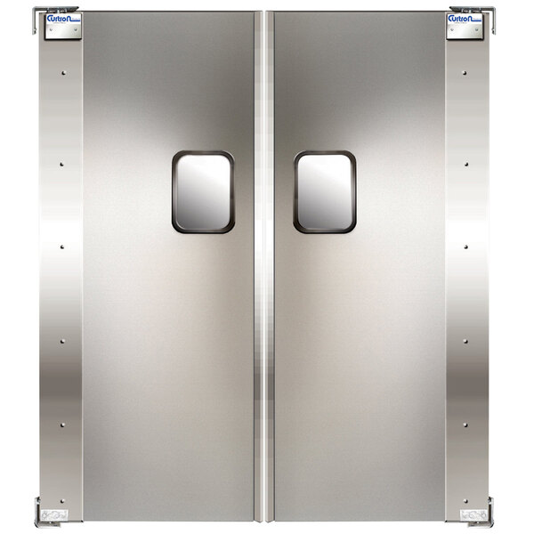 A white double aluminum swinging traffic door with rectangular windows.