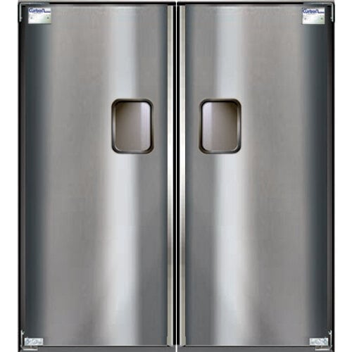 A close-up of a double stainless steel swinging traffic door with two handles on each.