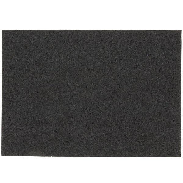 A black rectangular 3M stripping pad with a white background.