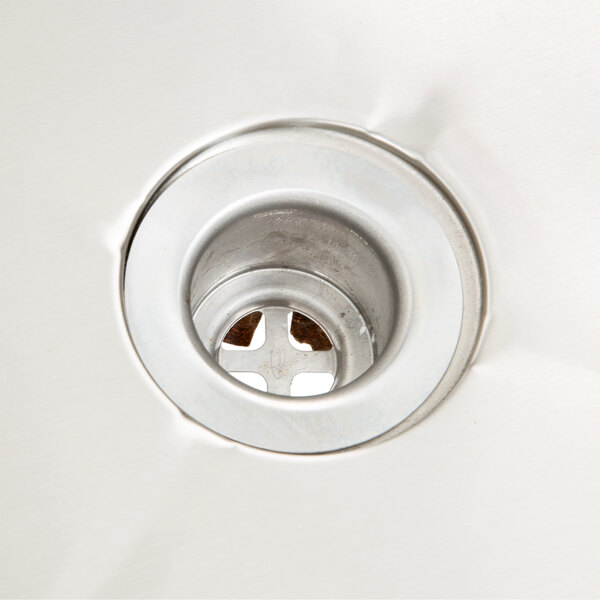 A close-up of an Eagle Group insulated underbar ice chest drain.