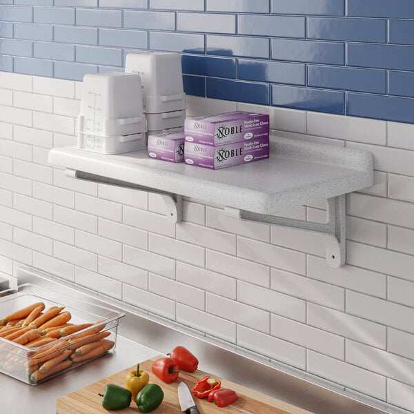 A Cambro Camshelving® wall shelf above a counter with food on it.
