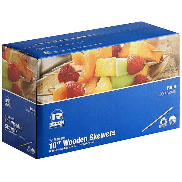 A box of Royal Paper Eco-Friendly Wood Skewers with fruit on them.