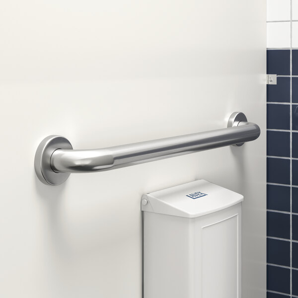 A white rectangular metal Lavex grab bar on a wall.