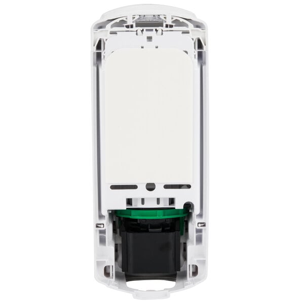 A white rectangular object with a black and green lid.