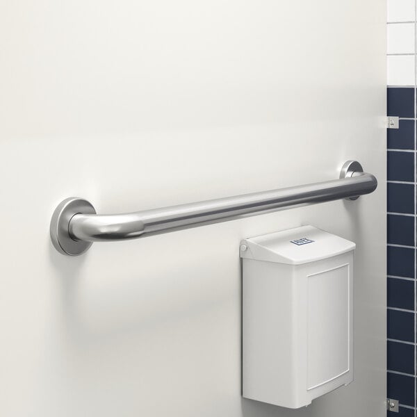 A white rectangular room with a metal Lavex restroom grab bar on the wall.