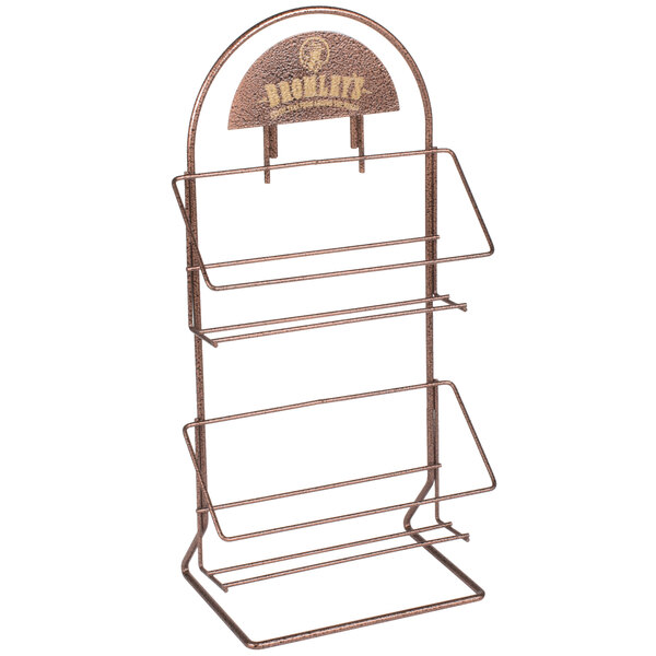 A metal Bromley tea rack with three shelves and a sign.