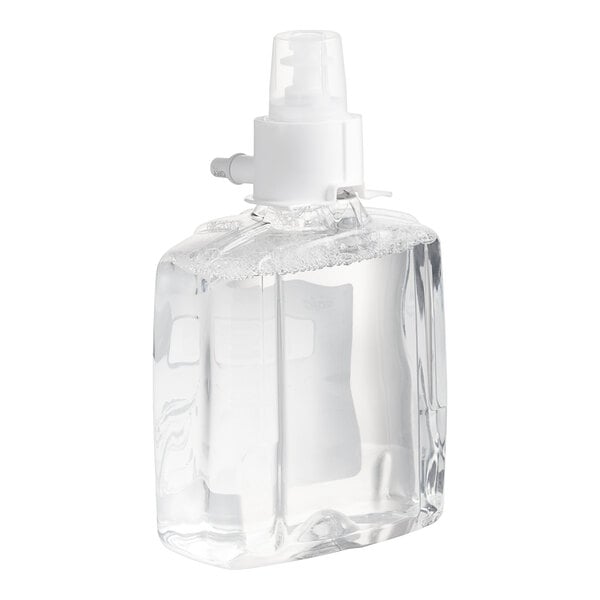 A clear plastic bottle of GOJO foaming hand soap with a white cap.