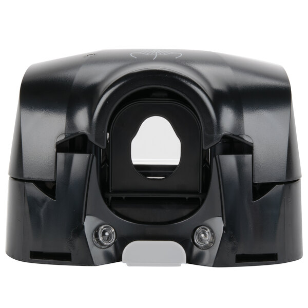 A close up of a black GOJO touchless hand soap dispenser with a hole for soap.