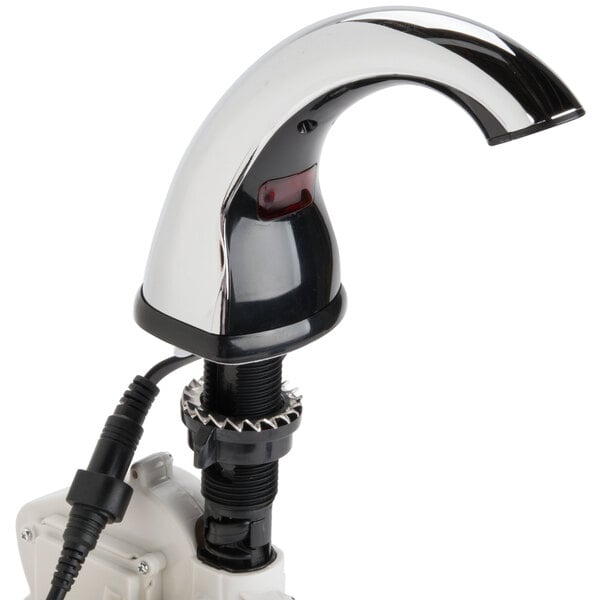 A GOJO chrome counter mount touchless soap dispenser.