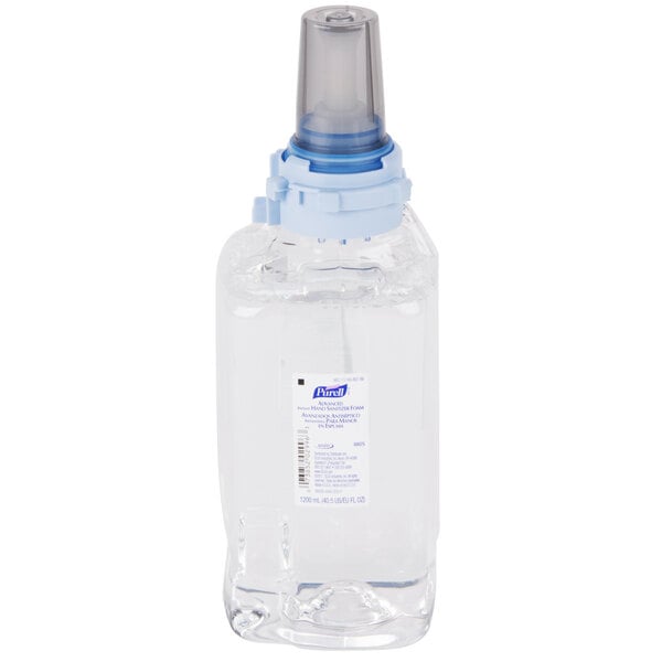 A clear plastic Purell hand sanitizer bottle with a blue cap in a white box with blue text.