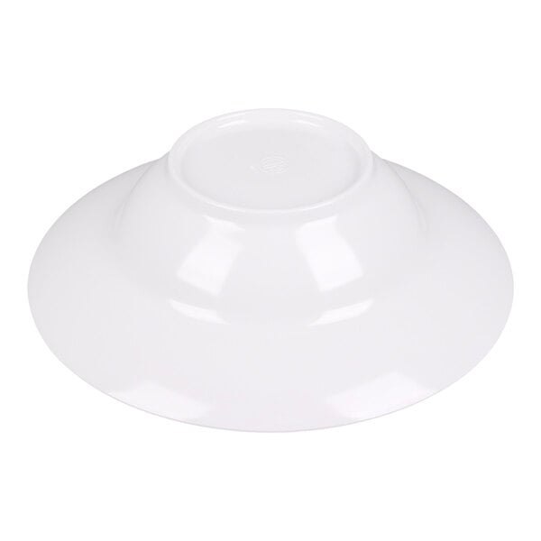 A white, round bowl shown upside down on a plain background.