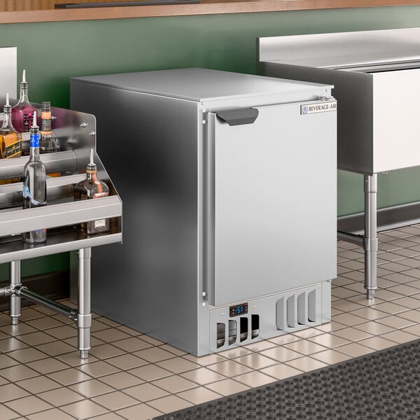 A stainless steel glass froster with a single door, designed for commercial use.