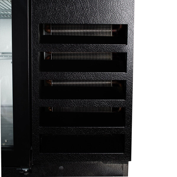 A Beverage-Air black pass through back bar cooler with open glass doors.