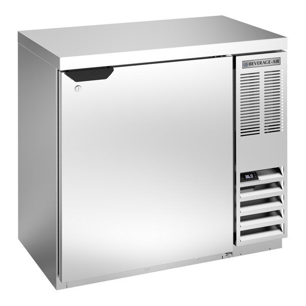 A Beverage-Air stainless steel back bar refrigerator with a solid door.