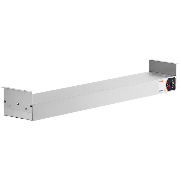 A white metal rectangular strip warmer with a metal handle.