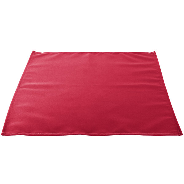 A hot pink square cloth napkin.